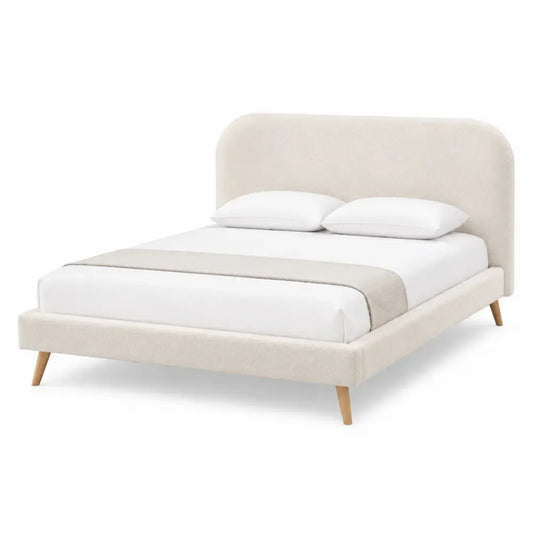Cama tapizada doble beige con patas de madera