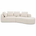 Sofá seccional curvo de tela bouclé crema 280 cm con cojines