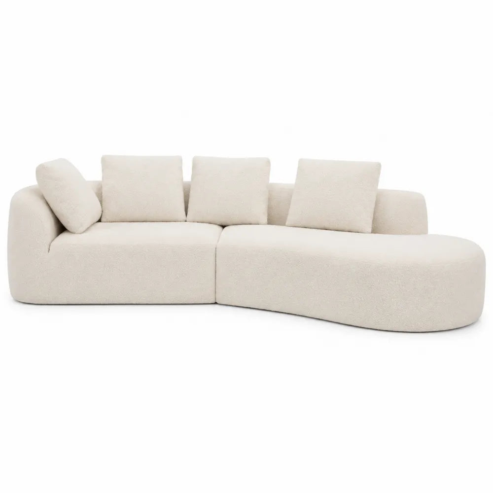 Sofá seccional curvo de tela bouclé crema 280 cm con cojines